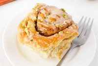 Pistachio Cinnamon Rolls Drizzled with Tahini Glaze