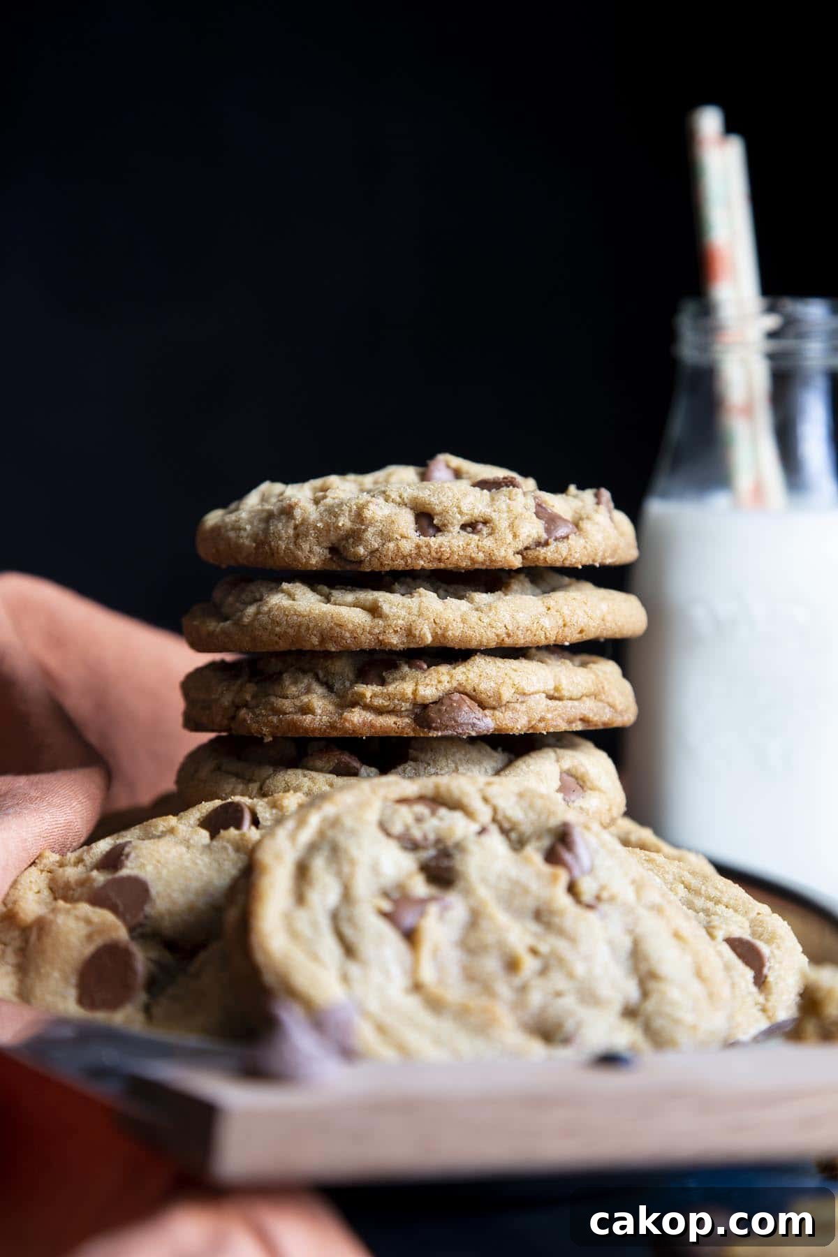 Chewy Milk Chocolate Chip Cookies Recipe for Perfect Cookies 2 A stack of milk chocolate chip cookies.