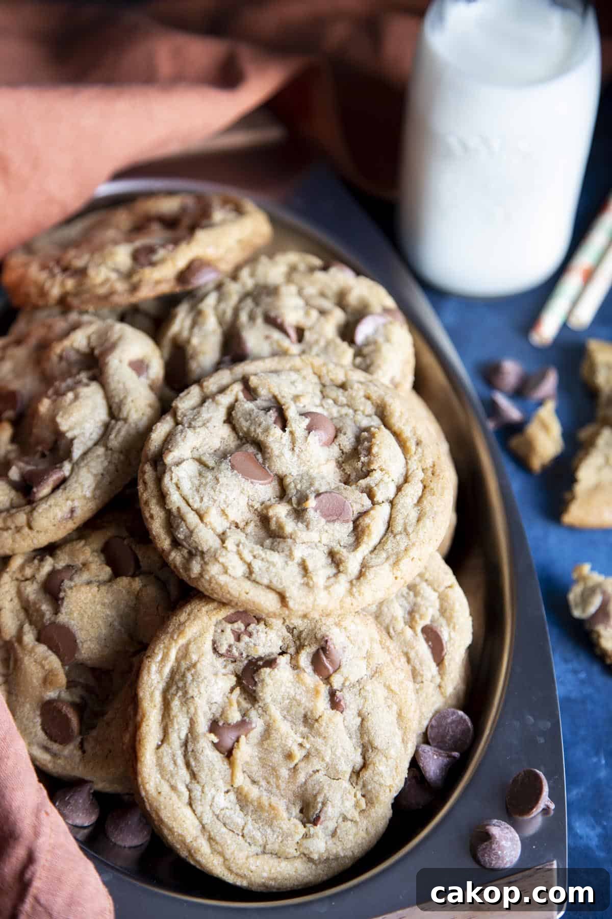 Chewy Milk Chocolate Chip Cookies Recipe for Perfect Cookies 9 Milk chocolate chip cookies on a metal tray.