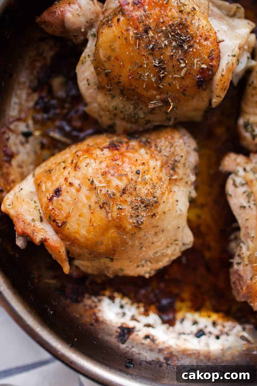 cooked chicken thighs with thyme seasoning