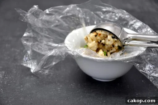 Scooping rice ball