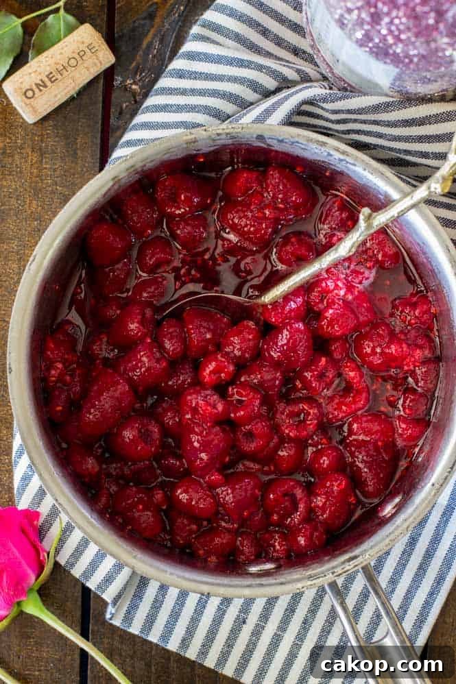 Raspberry and Chardonnay Trifles Recipe: Layered Wine-Infused Desserts 4 raspberries in chardonnay in saucepan