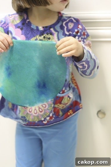 Coffee Filter Christmas Tree Ornaments Ideas and How to Make Them 5 green and blue coffee filter dyed with food colouring