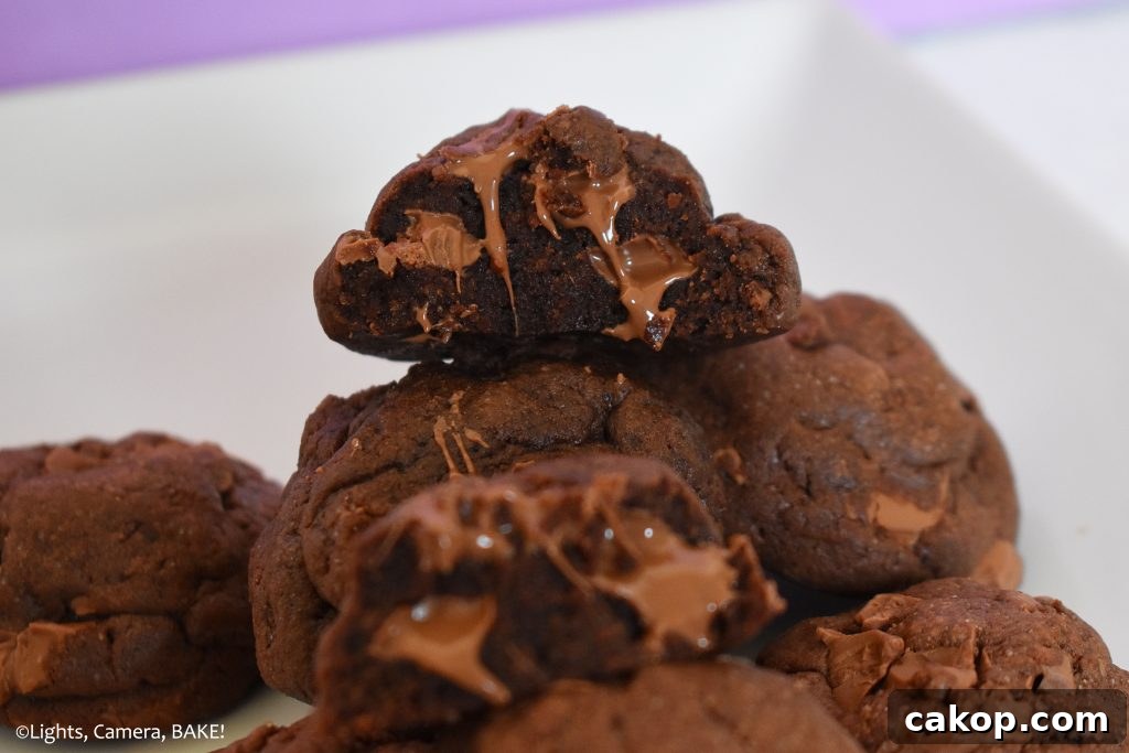 Ultimate Chocolate Chunk Cookie Recipe for Perfect Chewy Cookies 4 Melting chocolate cookies on a plate.