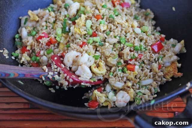 Authentic Chinese Shrimp Fried Rice Recipe — Quick Weeknight Meal 3 Shrimp Fried Rice in Wok © Jeanette's Healthy Living