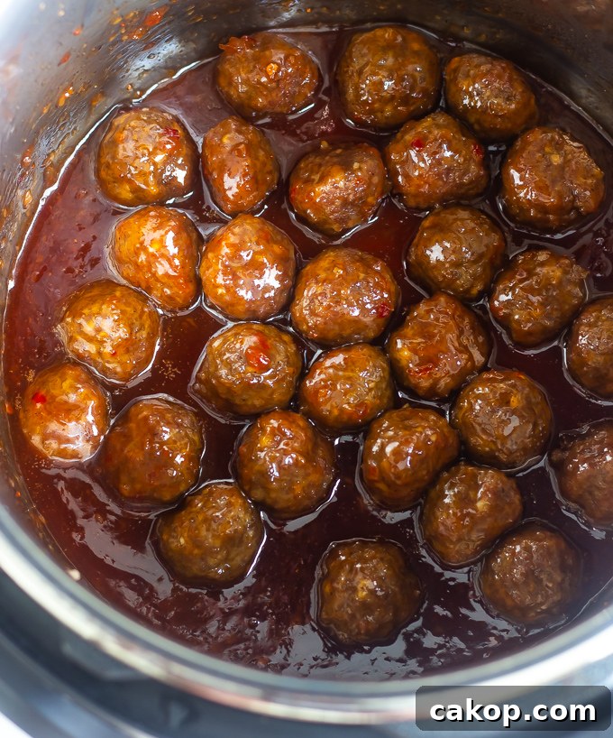 Homemade meatballs with jelly and chili sauce in an instant pot