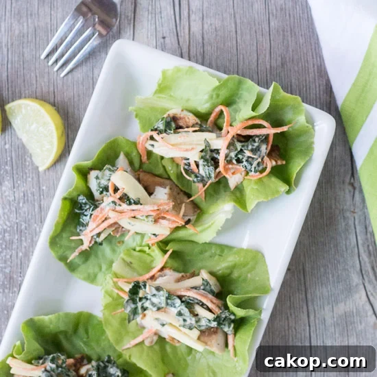 What to Serve with Coleslaw: 25+ Delicious Meal Ideas 10 overhead shot of easy fish tacos on a white platter with a white and green towel, a lime and a fork in the background