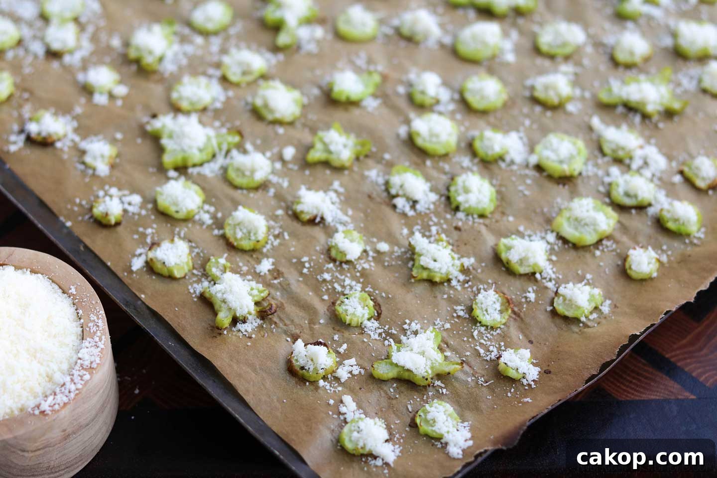 Just a little sprinkling of salty parmesan cheese is the perfect thing to transform oven roasted broccoli into something special!