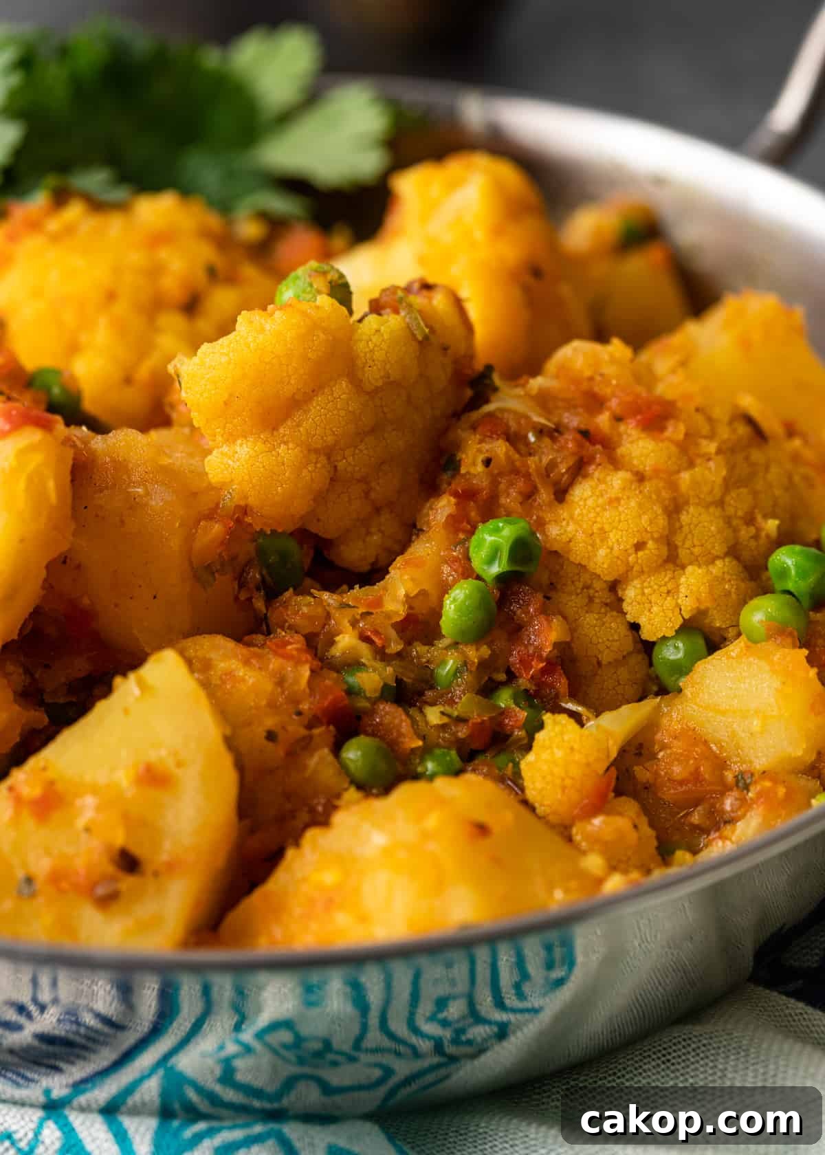 closeup of Aloo Gobi Matar in a bowl