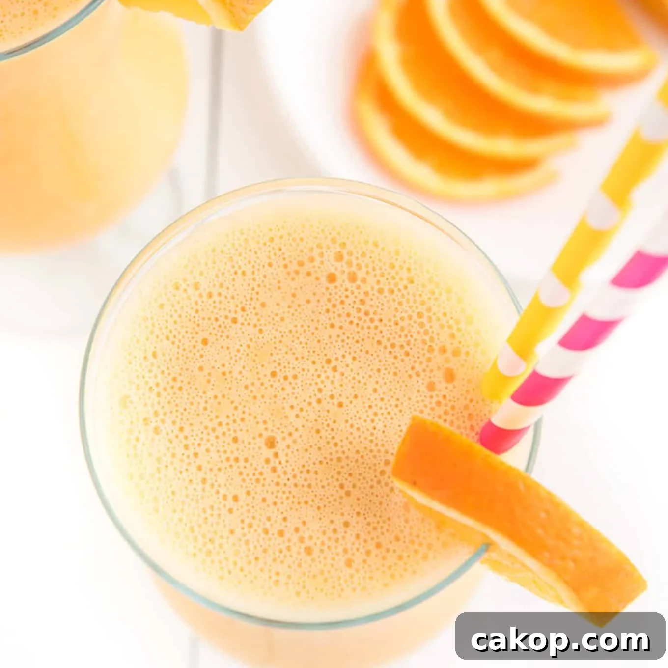 Creamy Orange Smoothie Recipe for Fresh, Zesty Mornings 7 Overhead shot of a delicious and healthy smoothie.