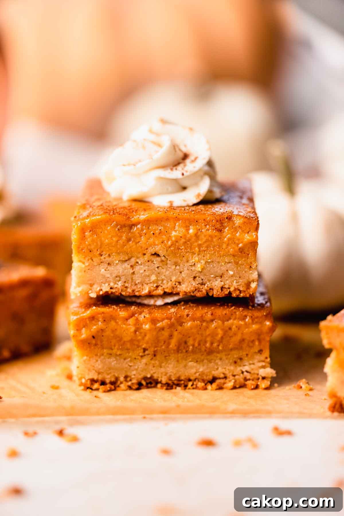 Creamy Pumpkin Pie Bars with Gingersnap Crust 17 stacked pumpkin pie bars