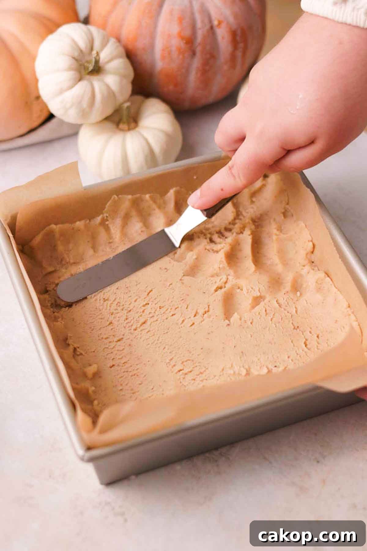 Creamy Pumpkin Pie Bars with Gingersnap Crust 9 spreading shortbread pie crust into pan
