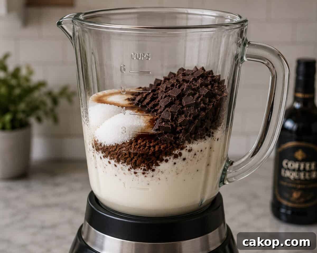 Blending ingredients to make Mocha Pots de Creme in glass blender.
