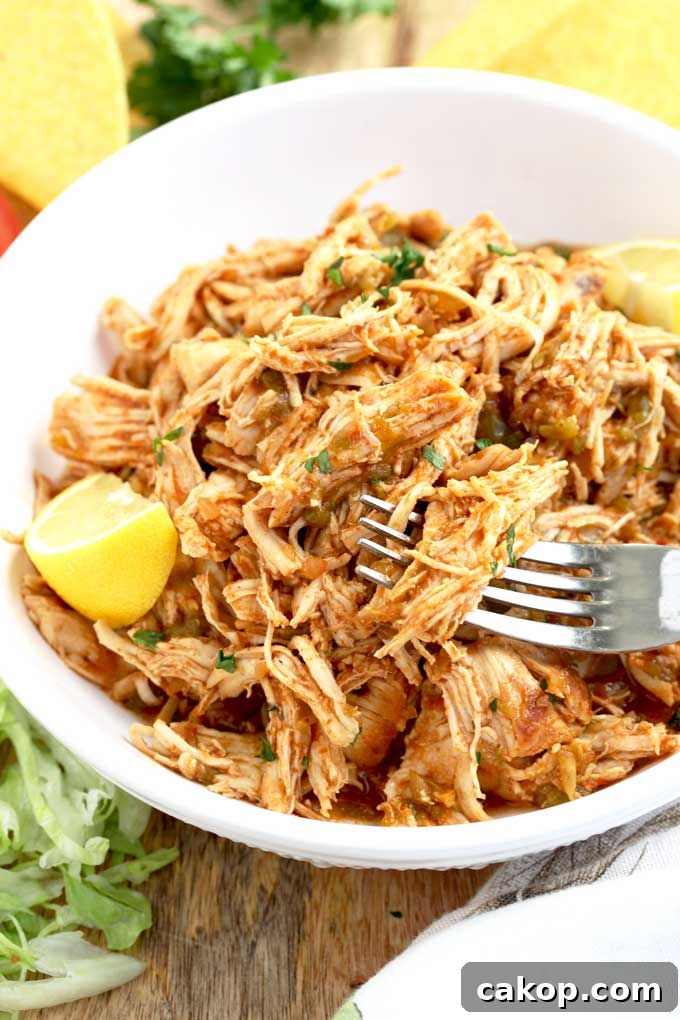 Instant Pot Shredded Chicken served in a white bowl.