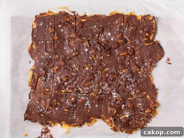 High-Protein Snickers Date Bark Recipe for Satisfying Snacks 17 Chocolate peanut butter date bark cut into squares after cooling