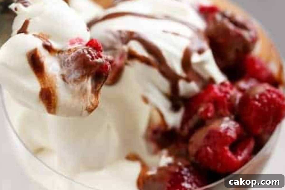 Spoon or drizzle the warm chocolate sauce over every parfait just before serving.