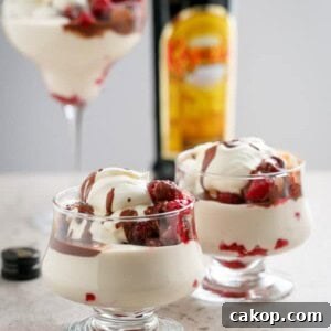 Creamy Kahlua Raspberry Cheesecake Parfaits in a cup