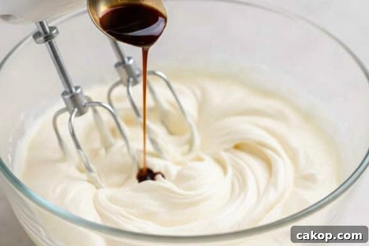 Beat the cream cheese, yogurt, and sugar together until smooth and creamy. Stir in the cooled coffee