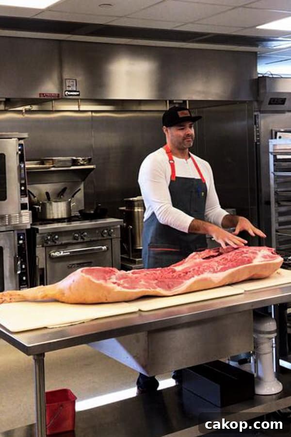 Chef Neel Sahni teaching us about different cuts of pork.