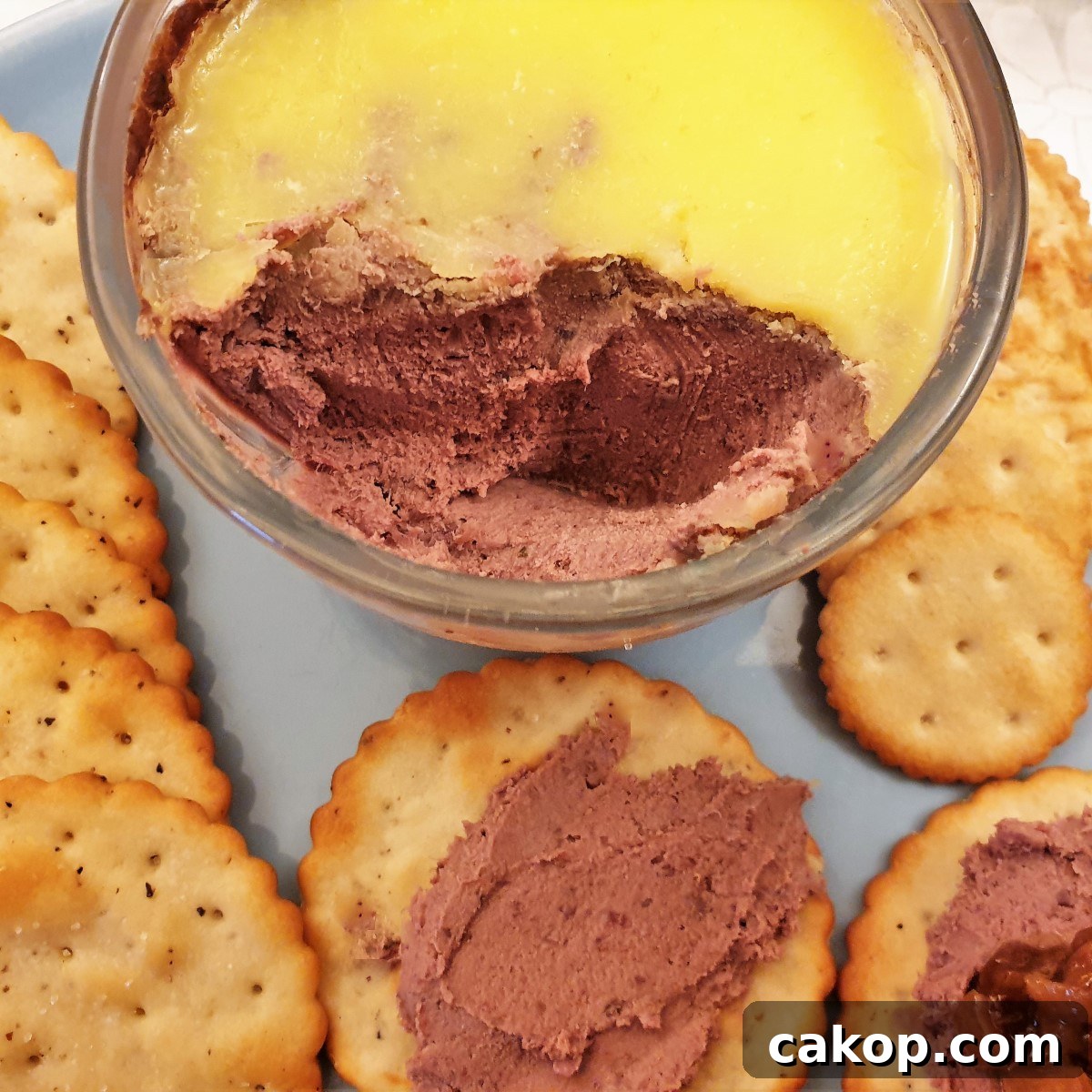 Closeup of a dish of chicken liver pate.