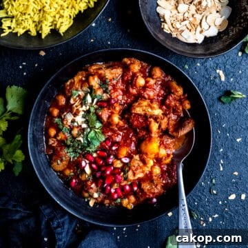 Slow cooker lamb tagine in a black bowl