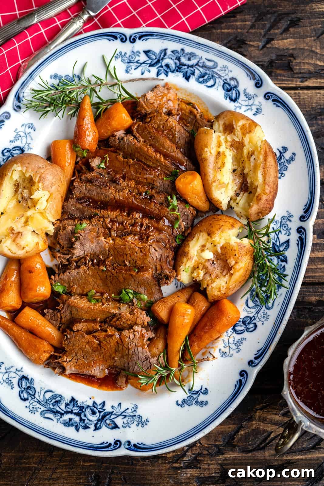 Instant Pot Beef Brisket with Garlic Smashed Potatoes 2 platter with sliced beef brisket, gravy, potatoes and carrots