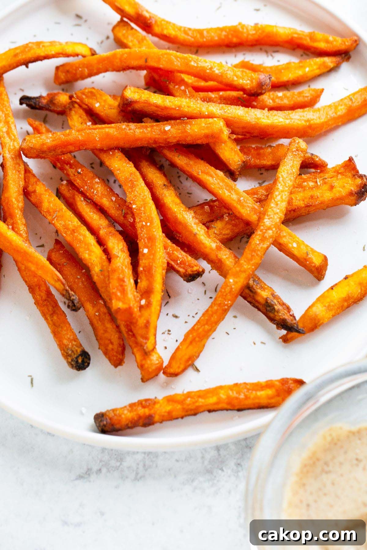 Sweet potato fries on a plate.