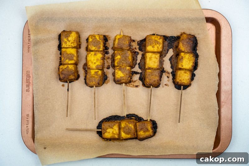 Vegan Tofu Satay Skewers with Creamy Peanut Sauce 6 Baking the tofu skewers