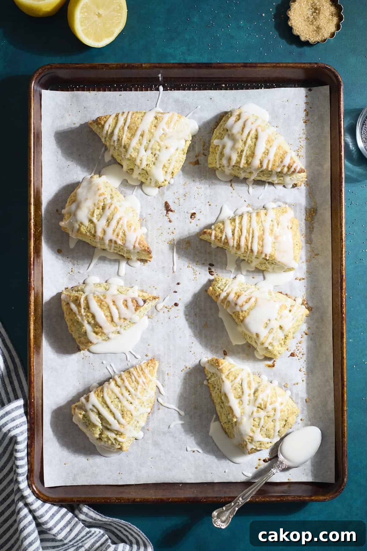 Sourdough Lemon Poppy Seed Scones Recipe for Tender, Tangy Bakes 11 Sourdough Lemon Poppy Seed Scones on a baking tray.
