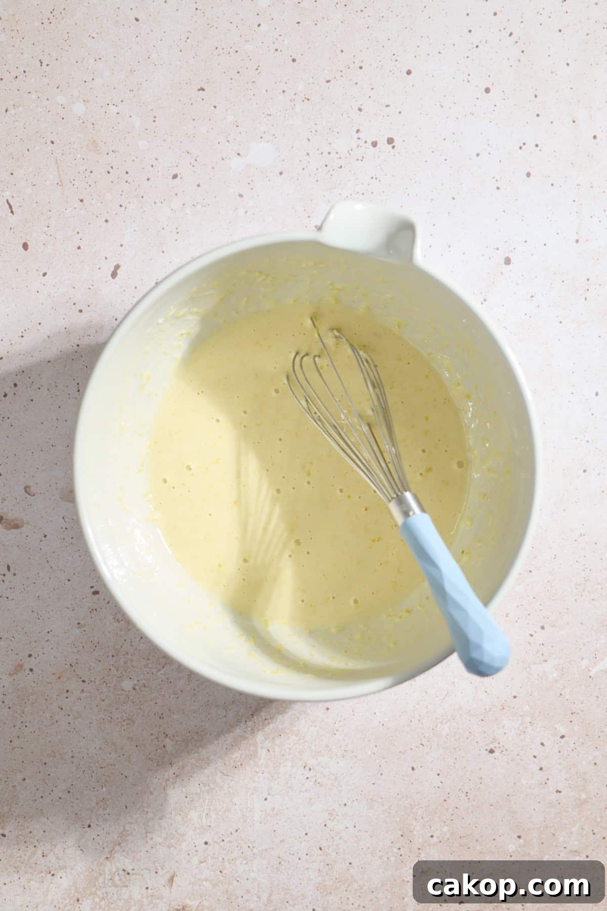 Sourdough Lemon Poppy Seed Scones Recipe for Tender, Tangy Bakes 4 Wet ingredients in a large mixing bowl.