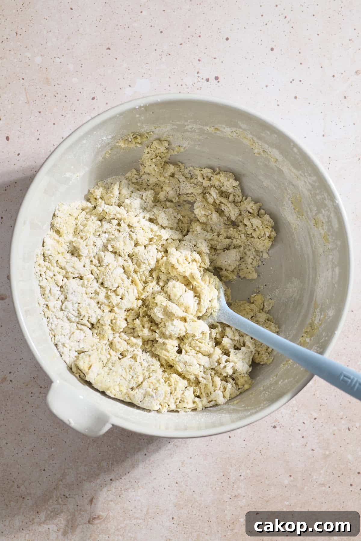Sourdough Lemon Poppy Seed Scones Recipe for Tender, Tangy Bakes 7 Dough coming together in a large mixing bowl.