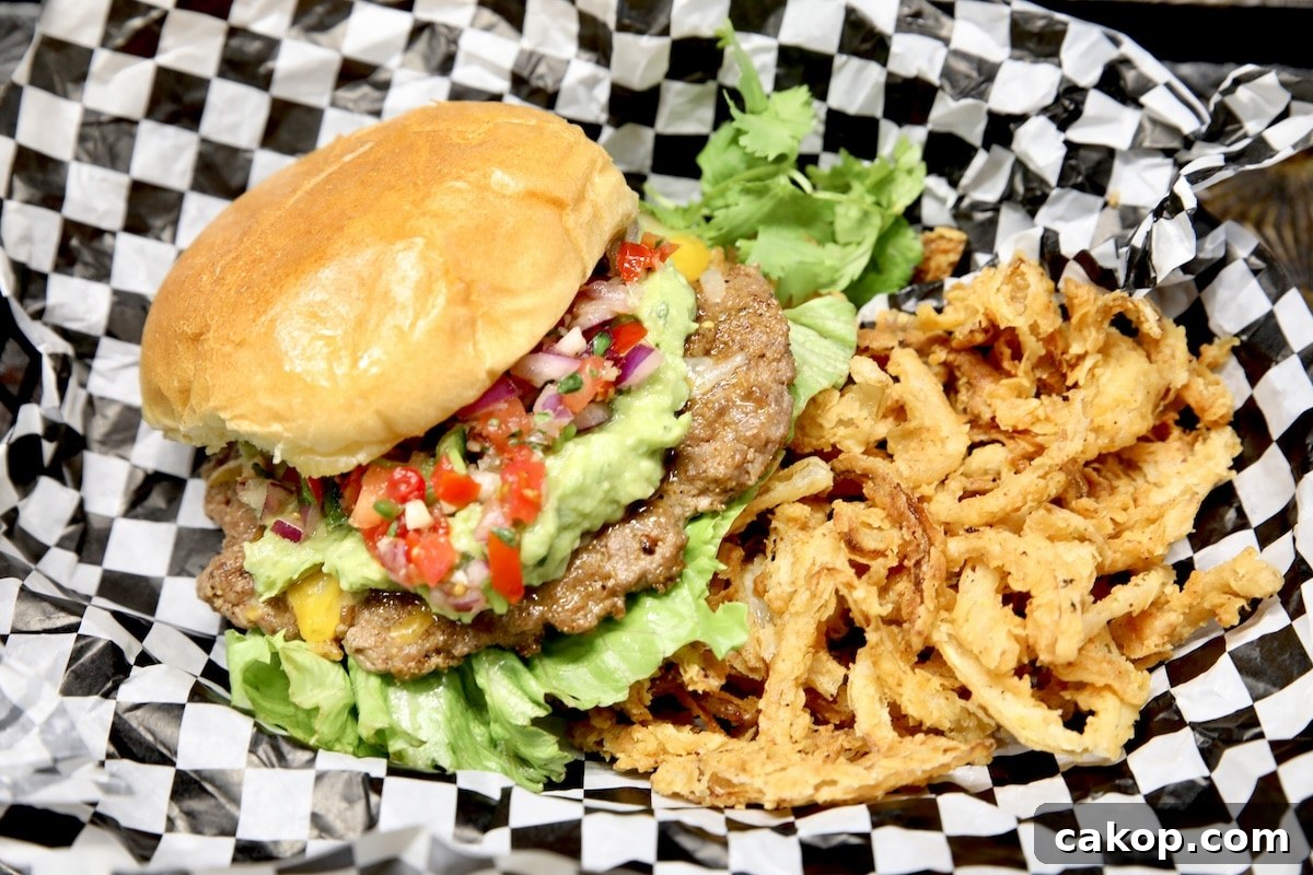 Smash burgers with salsa and guacamole. Guacamole burger with onion strings.