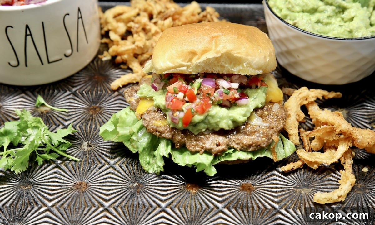 Guacamole Burger Recipe: Juicy Beef Patties with Fresh Avocado 6 Burger with guacamole and salsa.