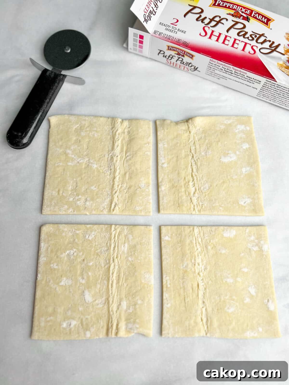 Strawberry Cheesecake Turnover Recipe — Flaky Pastry with Creamy Filling 7 puff pastry cut into four squares