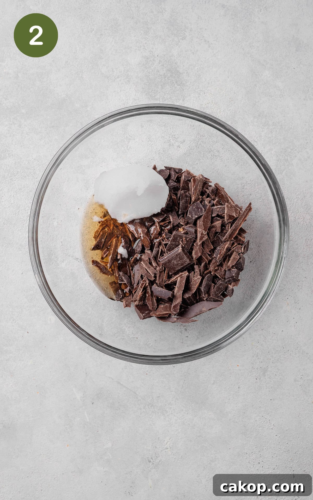 chocolate in a heatproof bowl, along with maple syrup and coconut oil.