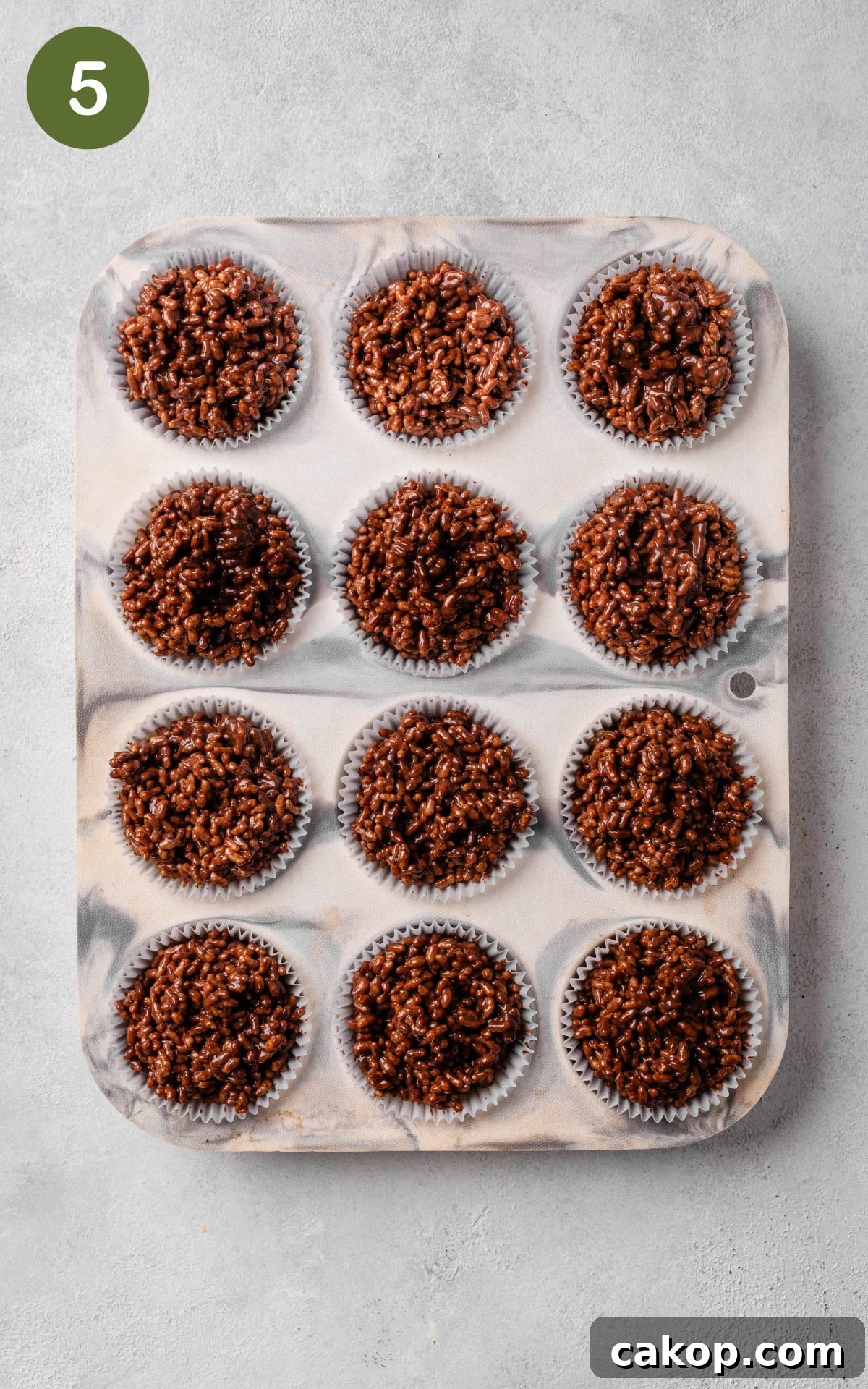 paper liners filled with the prepared rice crispy mixture.