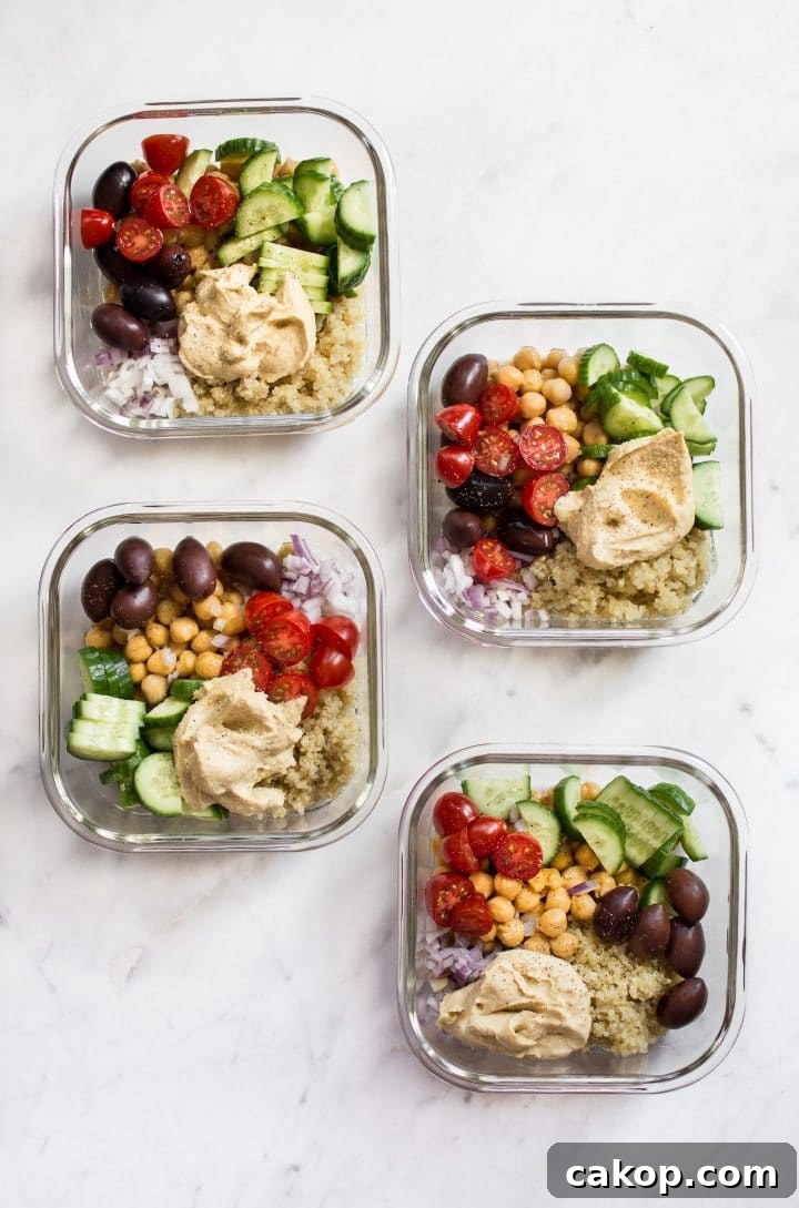 Mediterranean Vegan Meal Prep Bowls for Flavorful Weekly Lunches 3 four Mediterranean vegan meal prep bowls with quinoa, chickpeas, hummus, olives, tomatoes, and cucumber
