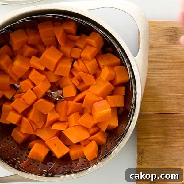 Creamy Sweet Potato Chocolate Pudding with Cottage Cheese 5 Steamed sweet potatoes in a pot.