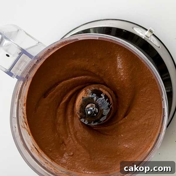 Creamy Sweet Potato Chocolate Pudding with Cottage Cheese 7 Blended sweet potato chocolate pudding in a food processor.