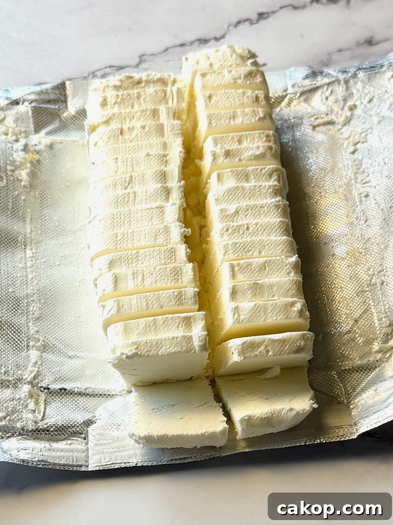 Mediterranean Marinated Cheese Bites for Party Appetizers 7 Cream cheese sliced in squares