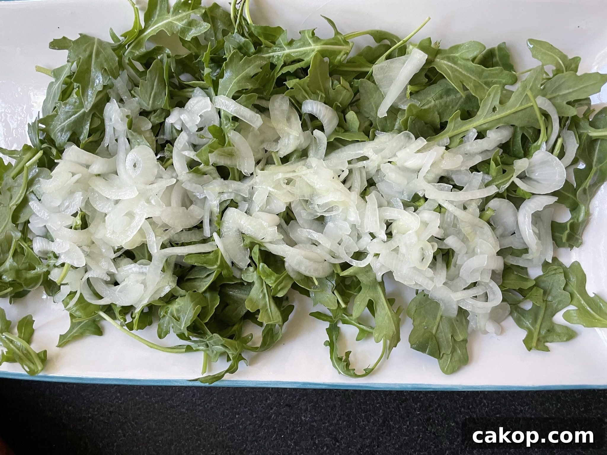 Arugula with pickled onions Arugula with pickled onions