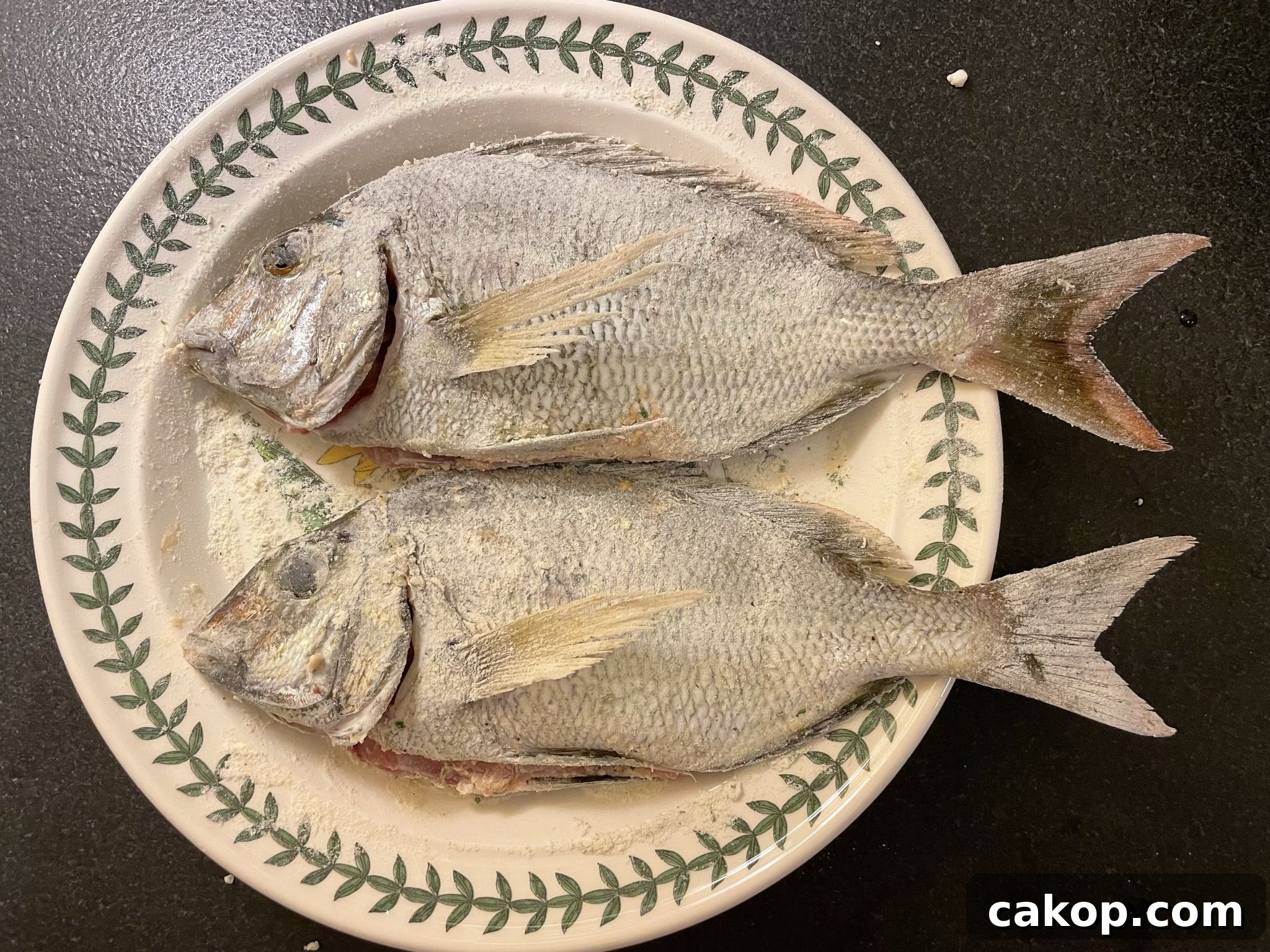Porgies dredged in flour seasoning Porgies dredged in flour seasoning