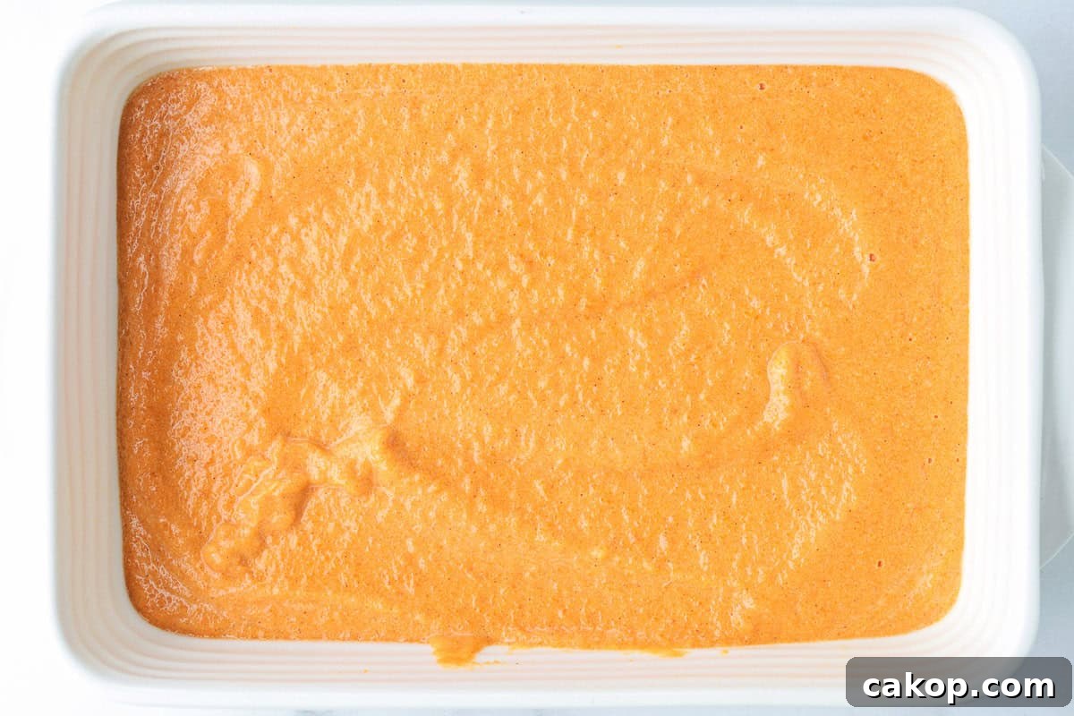 baking dish with carrot souffle before baking