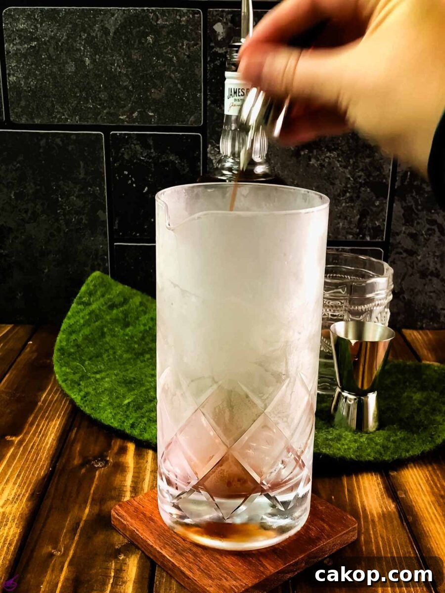 Add 3 dashes angostura bitters.