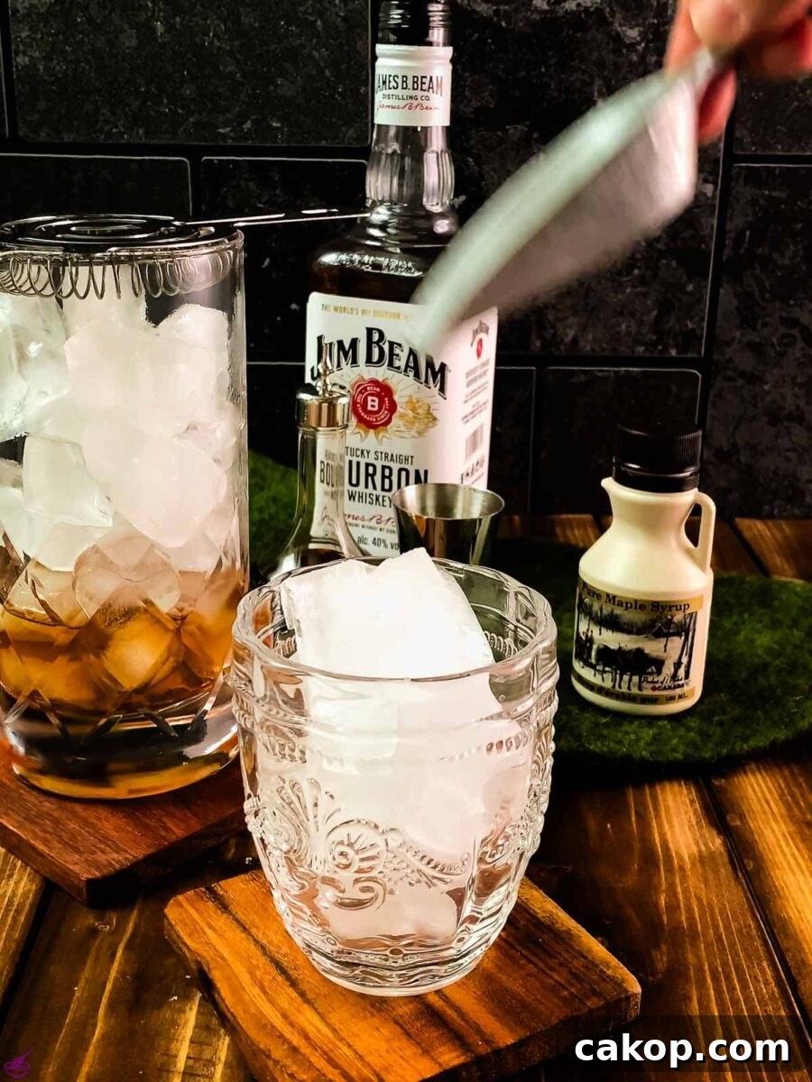 Add cubed ice to your serving glass.