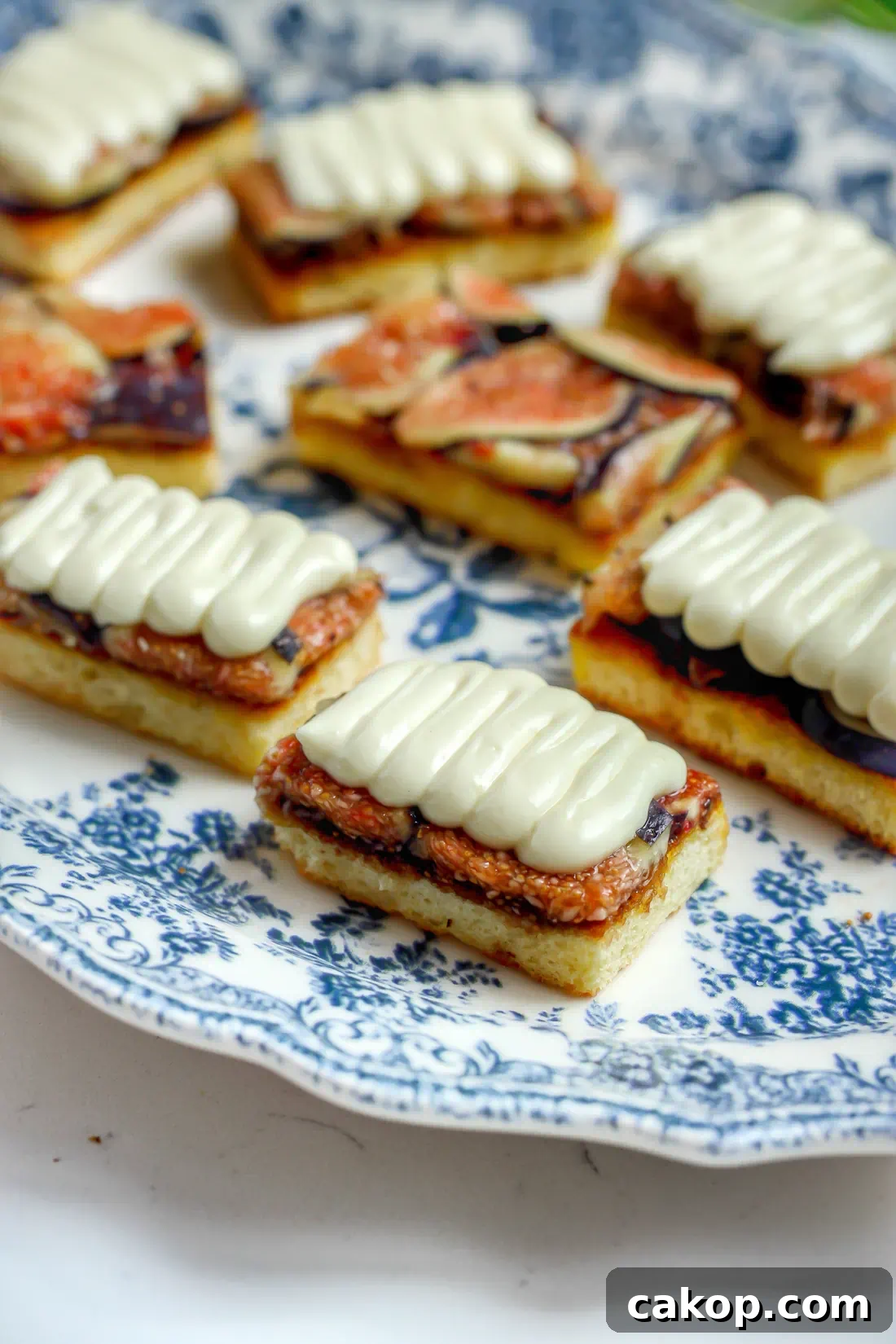 Whipped Brie and Fig Toast Recipe for Elegant Brunch 4 Rows of whipped brie and fig toast on toasted brioche, layered with creamy brie and fresh ripe figs.