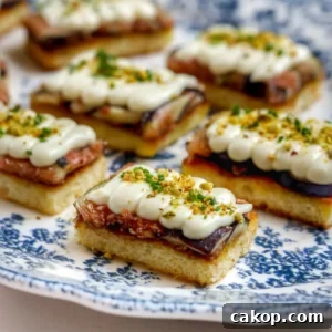 Whipped Brie and Fig Toast Recipe for Elegant Brunch 9 Whipped brie and fig toast recipe topped with honey and crushed pistachios on golden brioche.