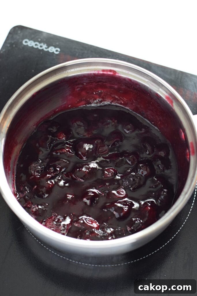 Blueberry sauce in a saucepan.