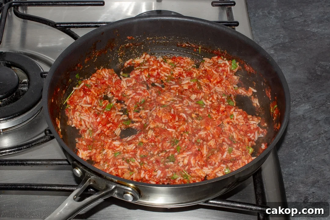 Rice stuffed peppers filling in a pan
