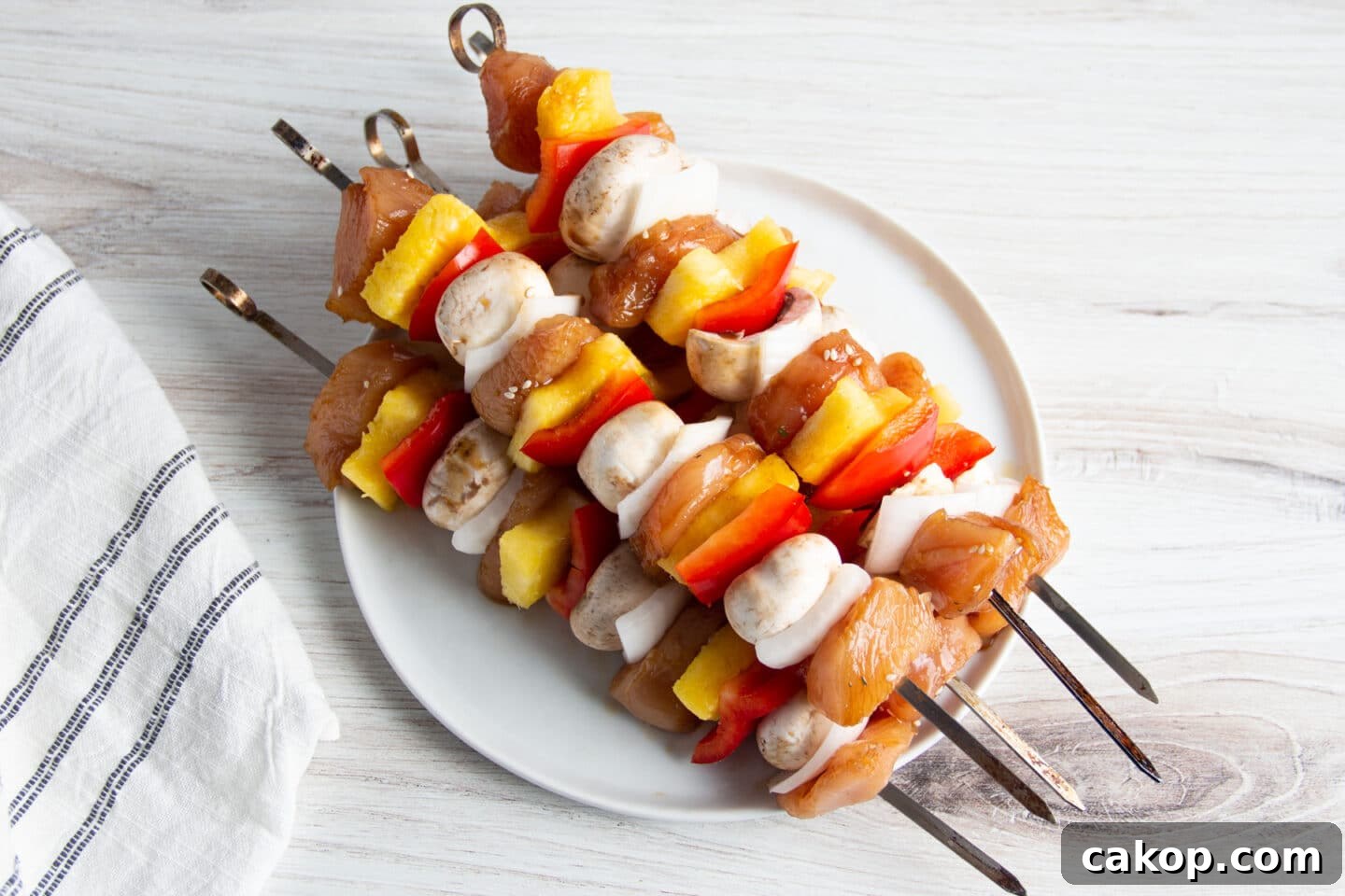 Grilled Teriyaki Chicken and Pineapple Kabobs Recipe 6 Picture of assembled skewers.